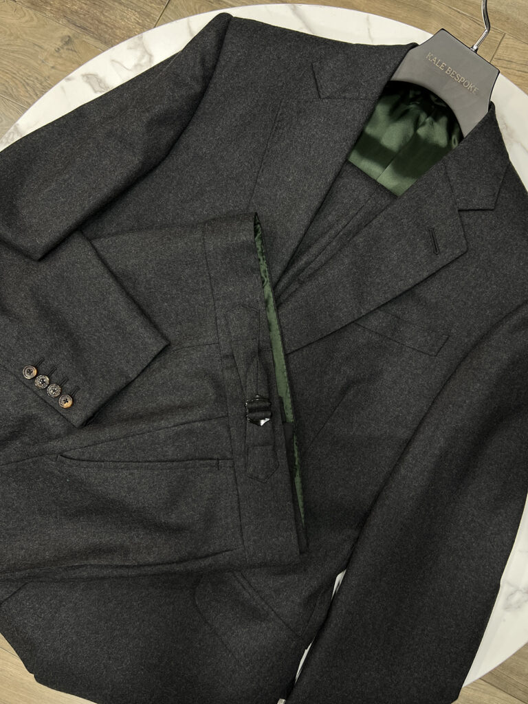 men's grey bespoke suit with green lining